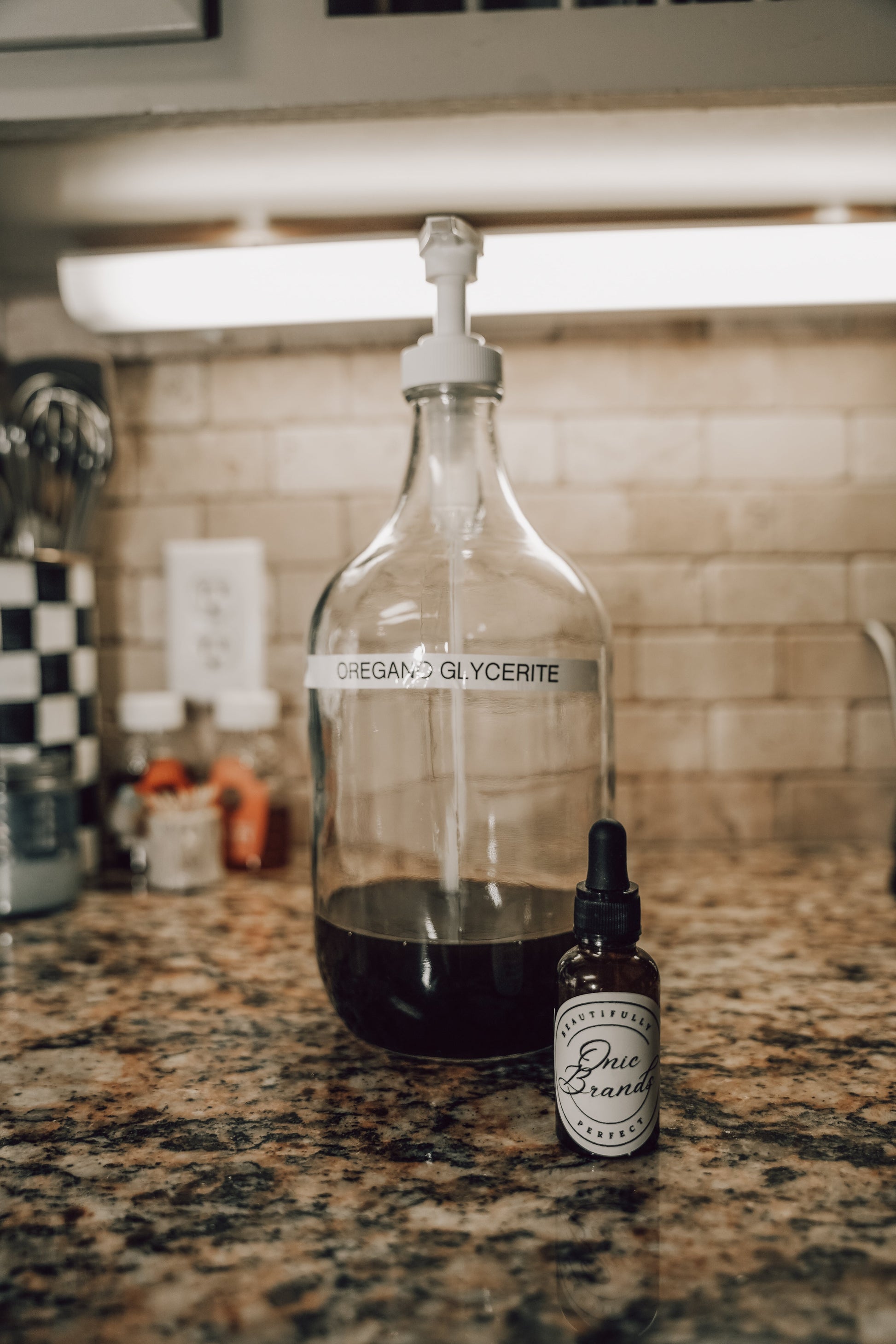 Onic Brands Elemental Oregano Glycerite Tincture bottle with dropper, herbal supplement for natural health support.