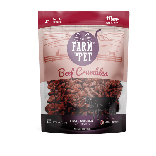 A bag of Farm To Pet Beef Crumbles for Cats shows beef crumbles, a cow illustration, and text noting these grain-free treats are 100% protein, single-ingredient, made in the USA, and specially crafted for cats.