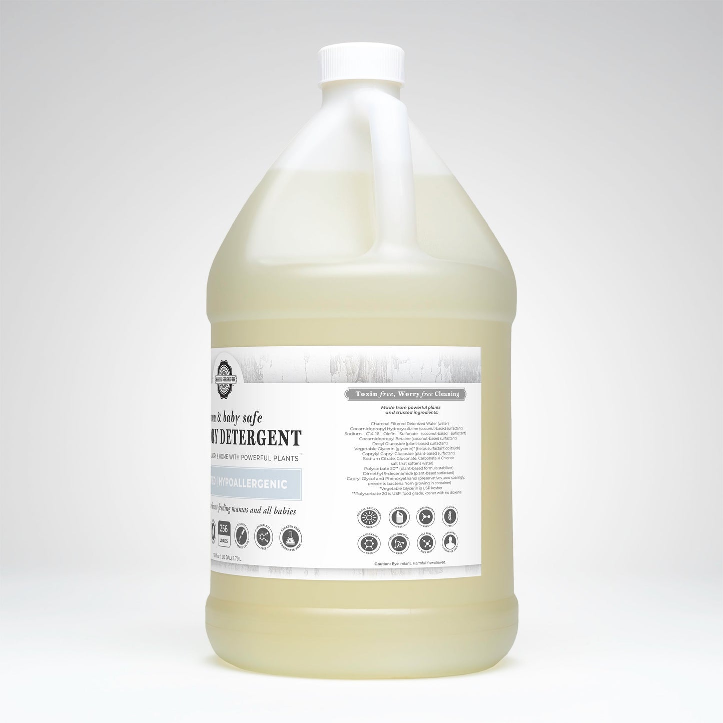 A large, translucent jug of Rustic Strength Laundry Detergent | Mama + Baby Safe with a white cap and label. The label features black and gray text highlighting that it is hypoallergenic and unscented.