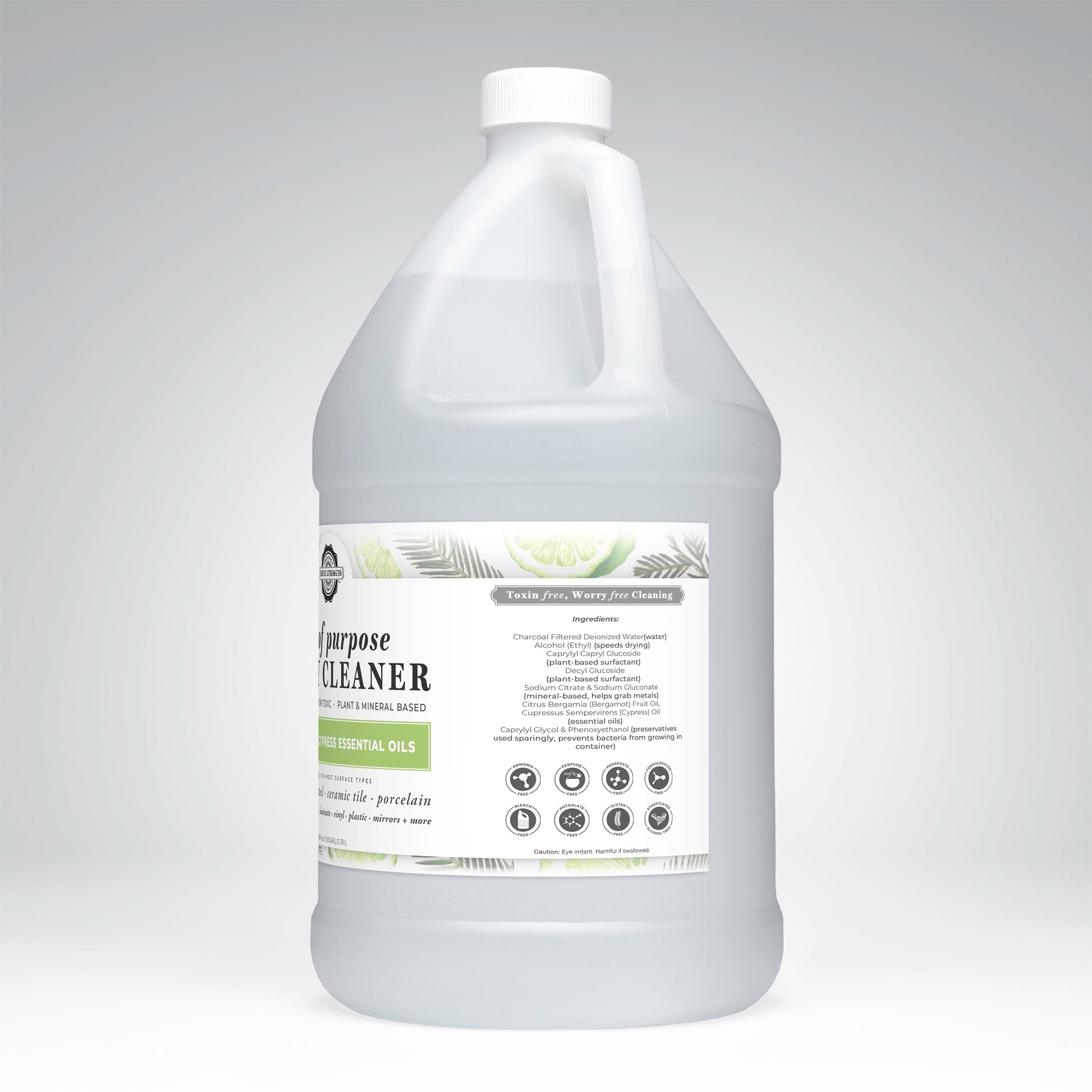 A white plastic gallon jug of Rustic Strength Lots of Purpose Spray Cleaner | Bergamot & Cypress, plant-based and toxin-free, with a gray cap and green-white label showing ingredients and natural, non-toxic icons on a light gray background.