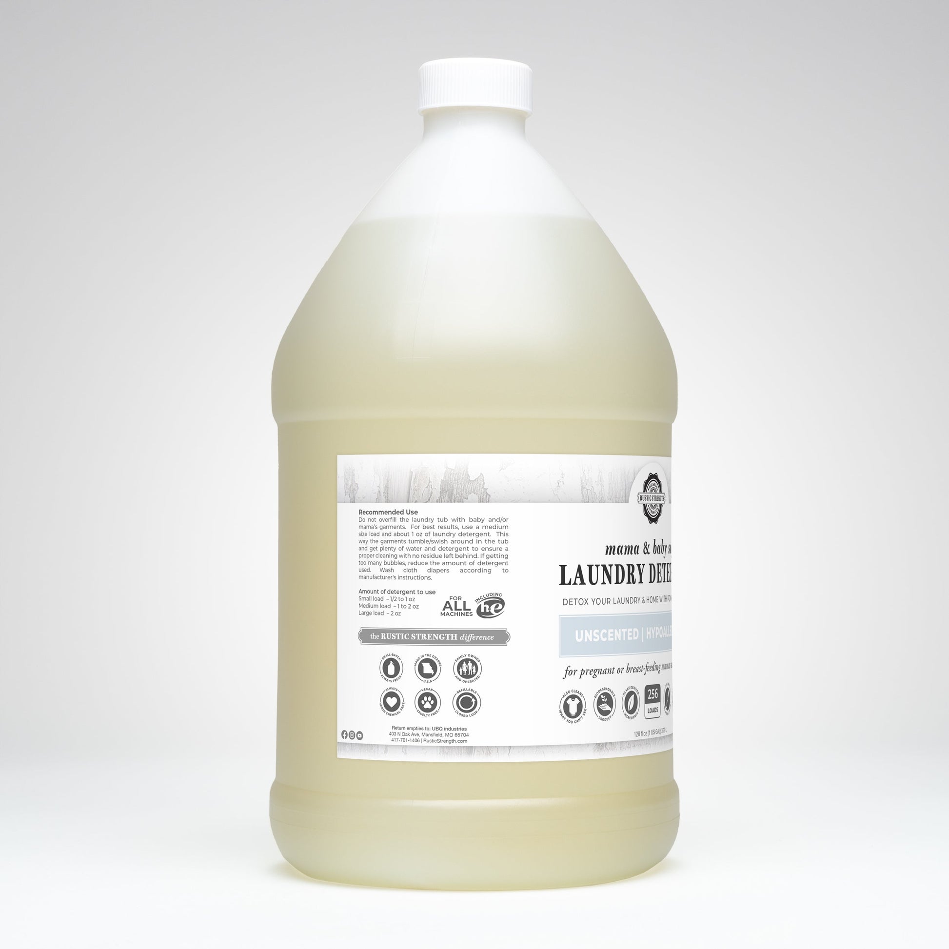 A large clear jug of Rustic Strength Laundry Detergent | Mama + Baby Safe, with a white label, is hypoallergenic, unscented, and safe for pregnant or breastfeeding women—making it an ideal detergent for babies.