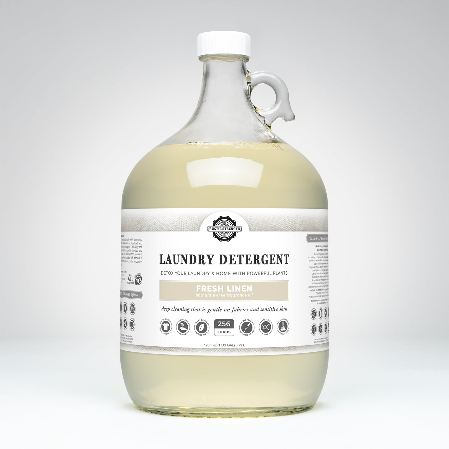 A clear gallon jug of Rustic Strength Laundry Detergent | Fresh Linen with a white label and cap, featuring 256 loads text, is shown against a plain white background.