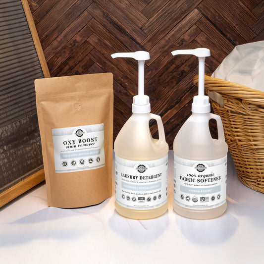 Rustic Strength Laundry Detox Set with plastic bottles, unscented laundry detox products, and cleaning accessories.