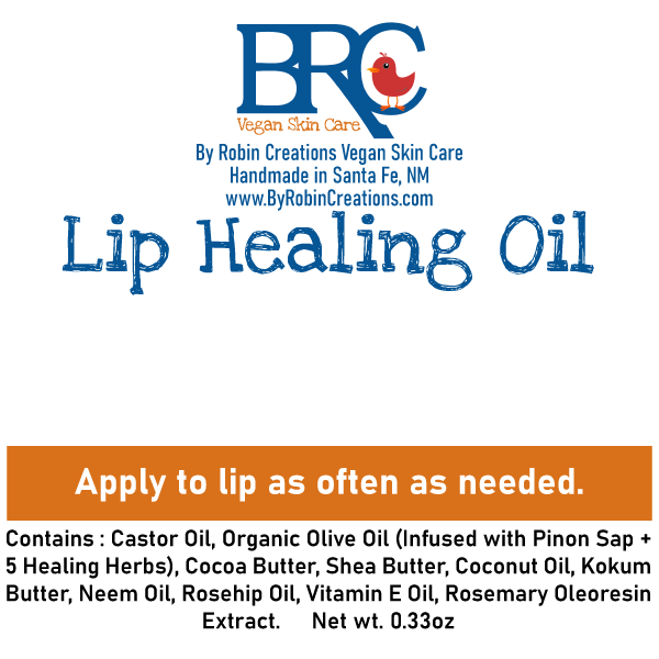 By Robin Creations lip healing oil, a nourishing lip balm with a sleek tube and clear branding, designed to repair and hydrate lips.
