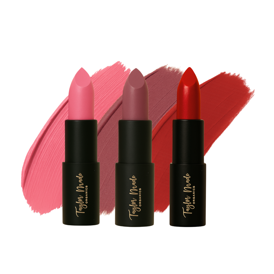 Swatch of three organic Taylor Made Organics lipstick shades showing vibrant colors and creamy textures.