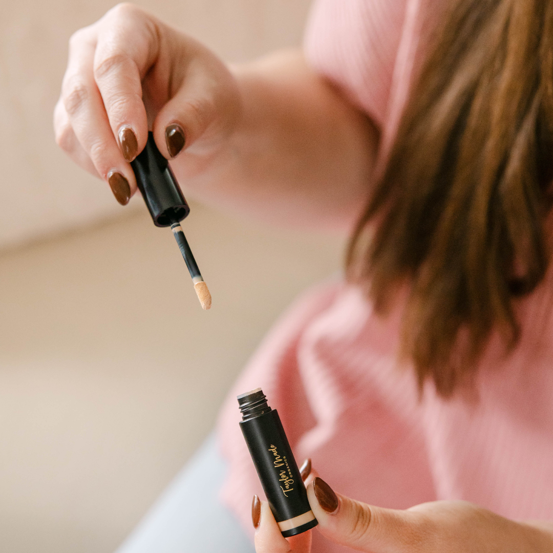 Liquid Organic Concealer by Taylor Made Organics, a creamy multitasking concealer in a sleek tube with a doe-foot applicator.