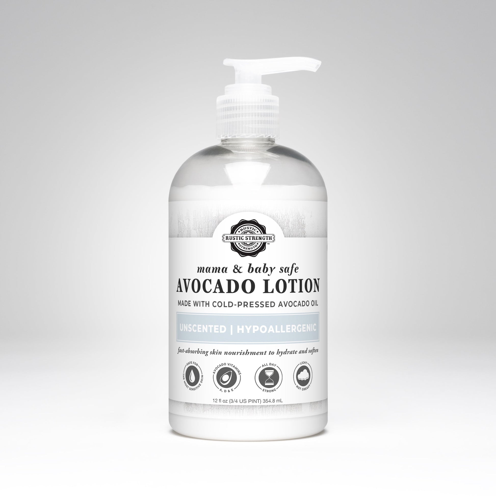 A clear pump bottle of Rustic Strength Avocado Lotion | Mama + Baby Safe, labeled unscented, hypoallergenic, and made with cold-pressed avocado oil, is set against a plain white background.