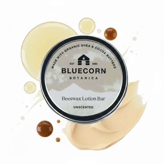 Unlabeled Bluecorn Beeswax Lotion Bar from Bluecorn Candles in natural, unscented form, showing its smooth, solid shape.