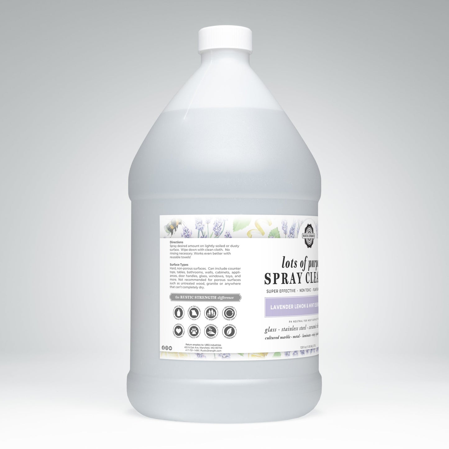 Rustic Strength’s Lots of Purpose Spray Cleaner | Lavender, Lemon & Mint is a plant-based, toxin-free, pH-balanced cleaner in a large translucent jug with white cap; front label displays directions and surface icons.