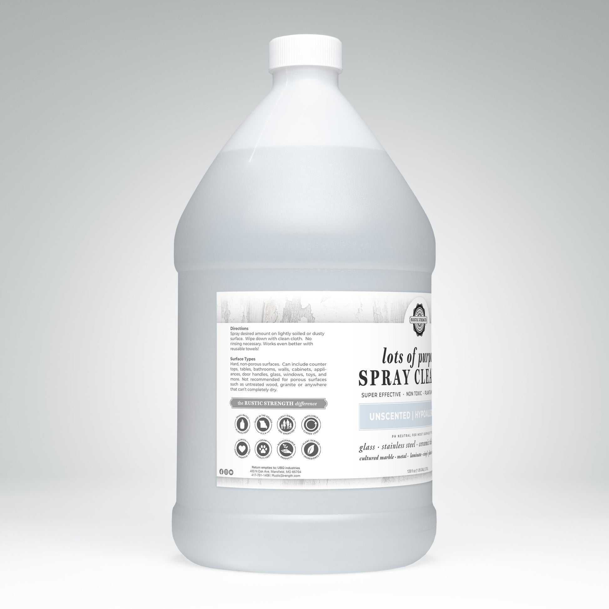 A large translucent gallon jug of Rustic Strength’s Lots of Purpose Spray Cleaner | Unscented features directions and icons on the white label; this toxin-free, unscented cleaner is safe for use on multiple surfaces.