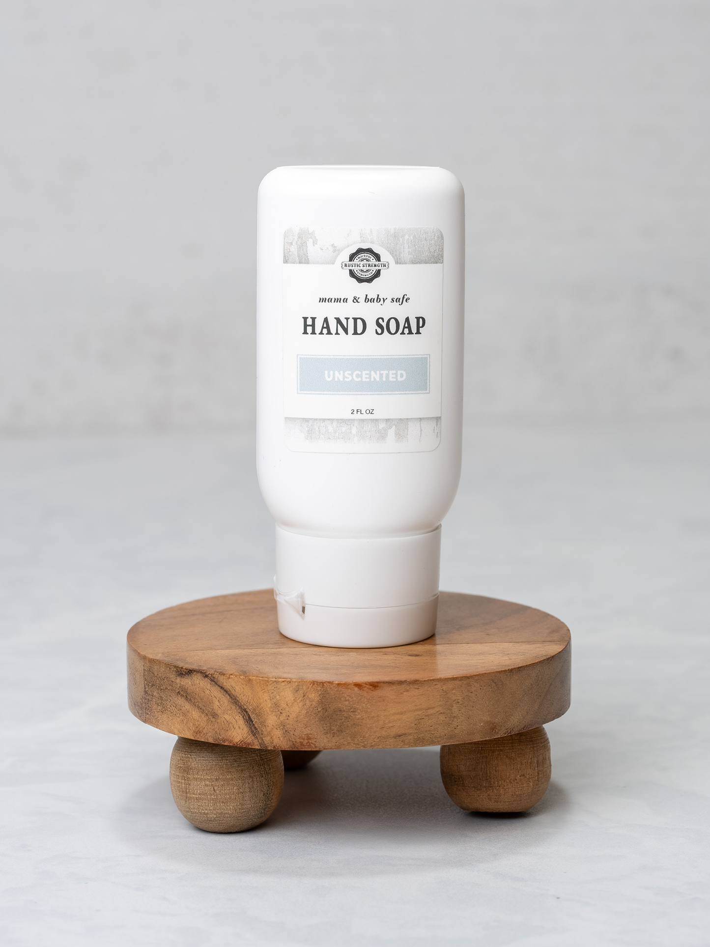 Rustic Strength Mama and Baby travel bath and body kit with 2 oz hand soap, featuring a charming, natural design.