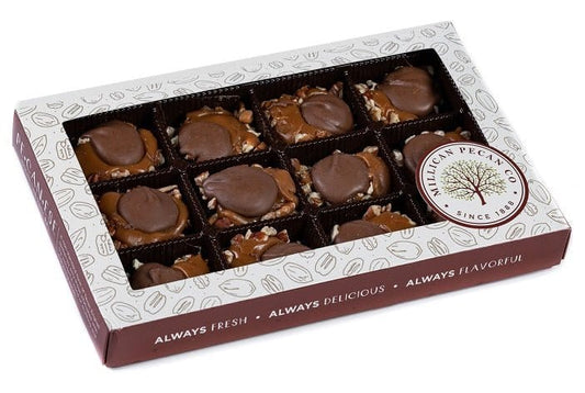 Millican Pecan milk chocolate Caramillicans gift box featuring pecan-filled chocolate treats in an 8oz box.