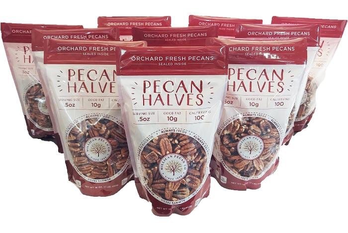 Fresh Millican Pecan shelled halves, raw and natural, displayed in a 10 lb bag for baking and snacking.
