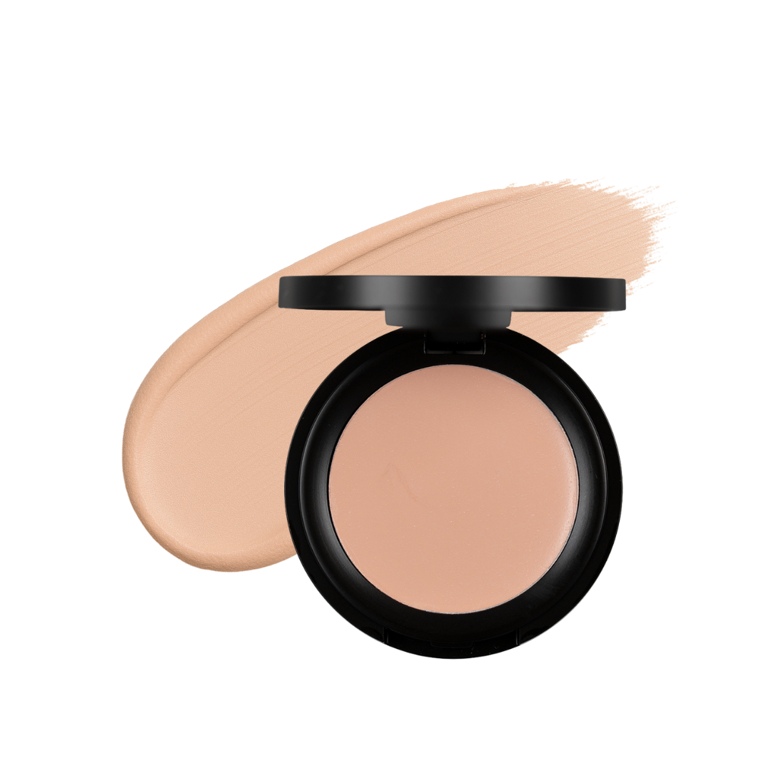 Taylor Made Organics cream concealer in a natural shade, lightweight and versatile for smooth skin coverage.
