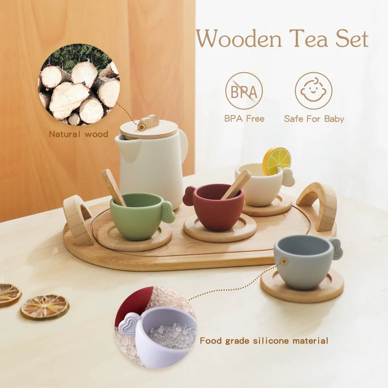 Toy tea party set by Petite Pioneers featuring miniature teacups, plates, and utensils for kids' pretend play.