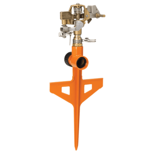 Orange Dramm ColorStorm Impulse Circular Stake Sprinkler set up outdoors, showing its orange stake and spray pattern for watering gardens.