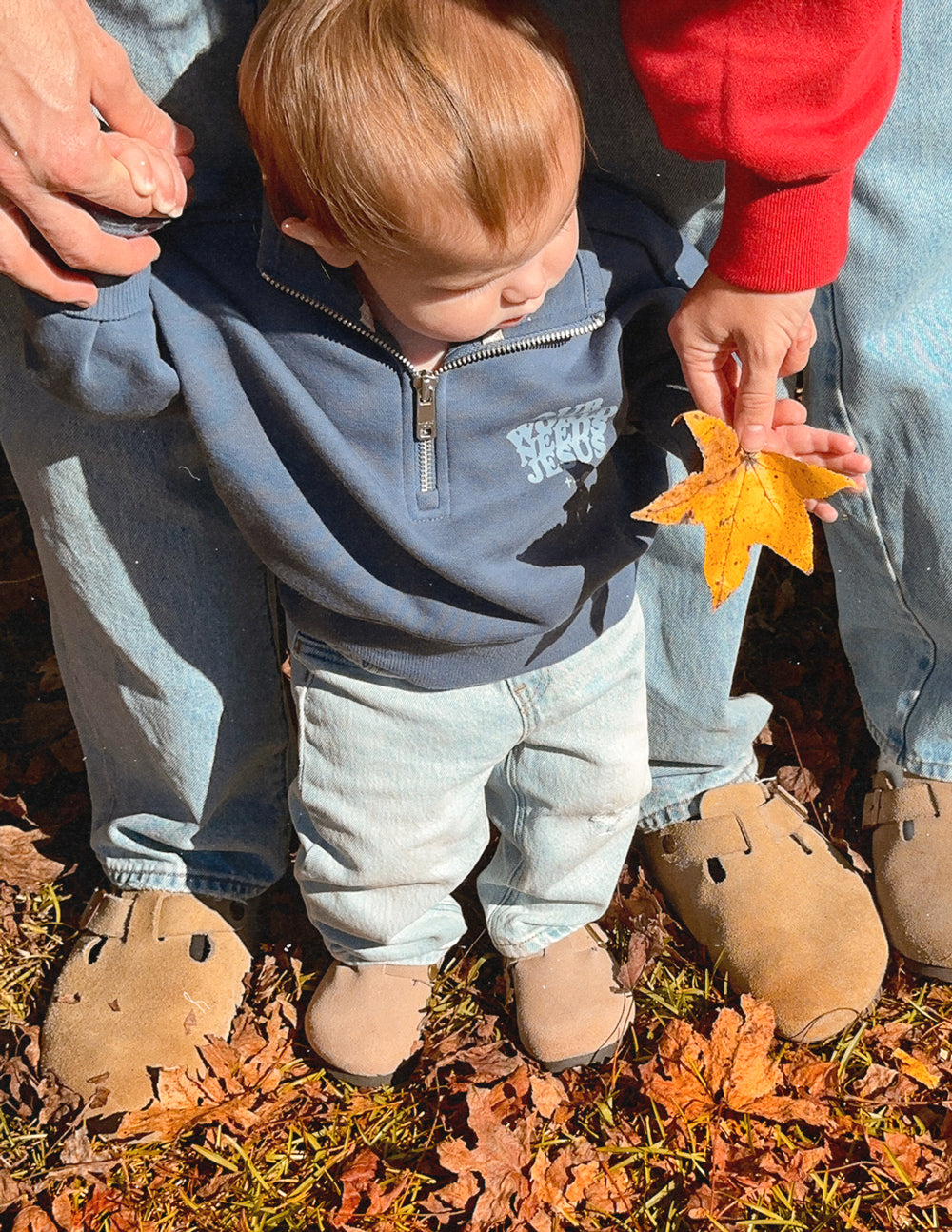 Our World Needs Jesus Kids Half-Zip - Blessings Grow Meadows