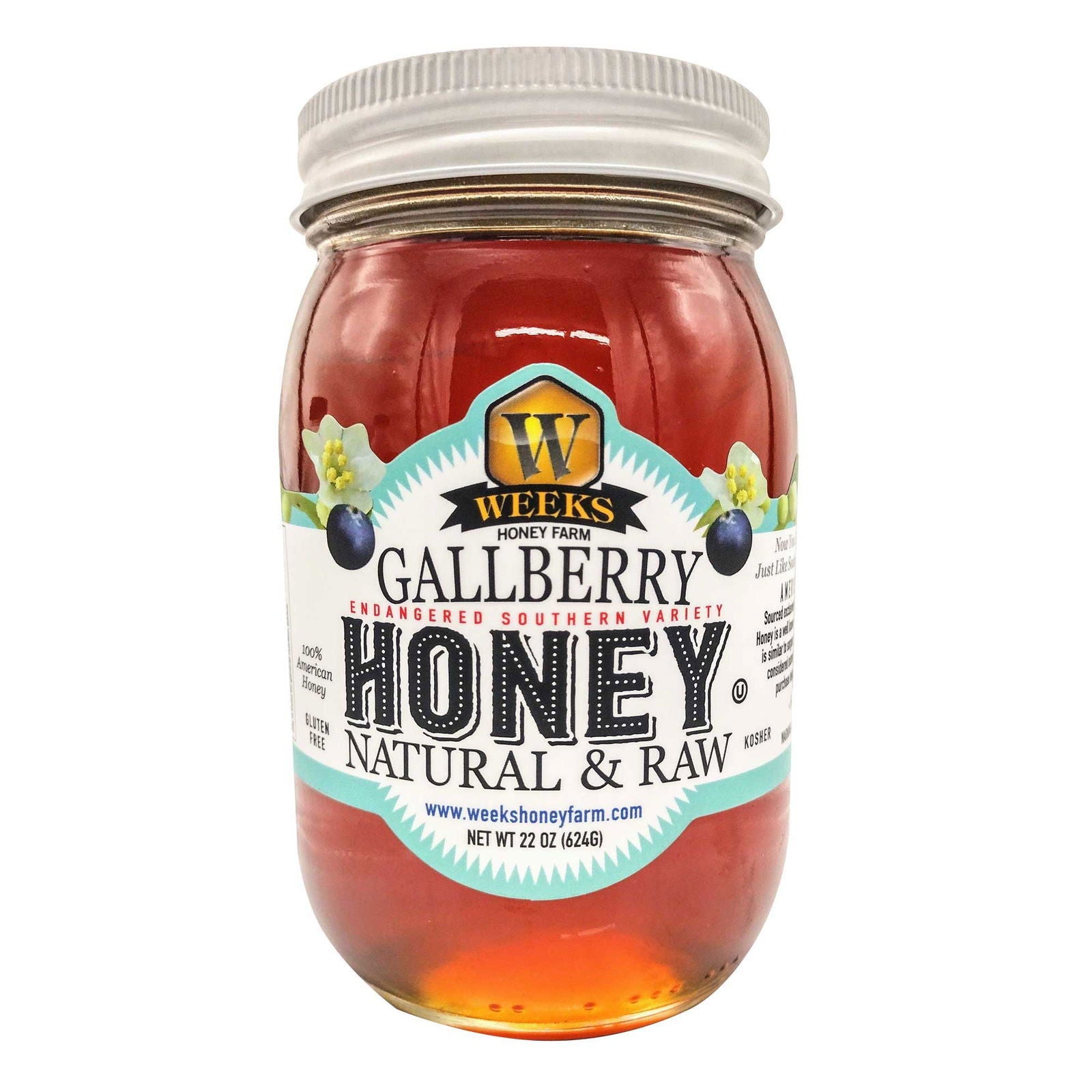 A clear glass jar of Weeks Naturals | Weeks Honey Farm’s Our Best All-Natural Pure Raw Gallberry Honey features a metal lid and amber honey inside, with the label highlighting its Georgia wild origin and all-natural raw quality.