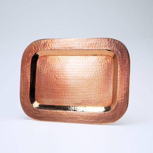Small copper Thessaly rectangle platter by Sertodo, showcasing a handcrafted metal serving plate with a smooth, polished finish.