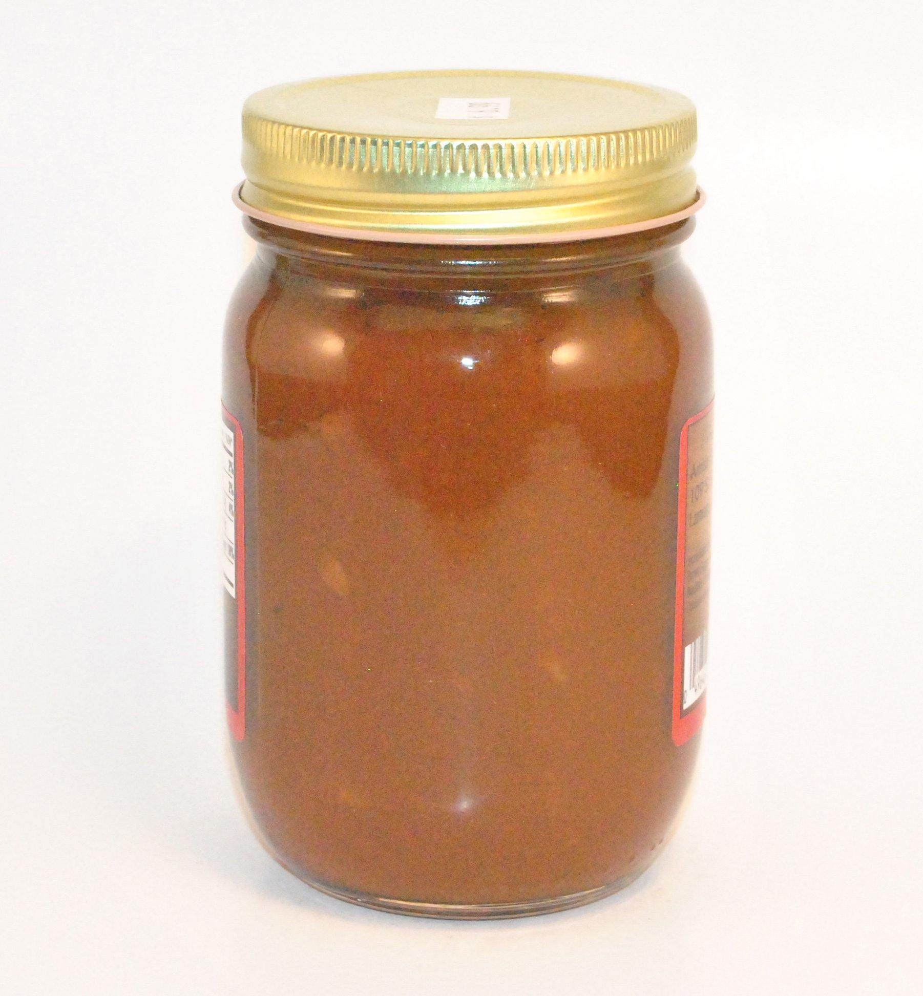 Canned Pecan Pumpkin Butter from Amish Country Store in a jar, showcasing a smooth, creamy pumpkin spread with pecan pieces visible.