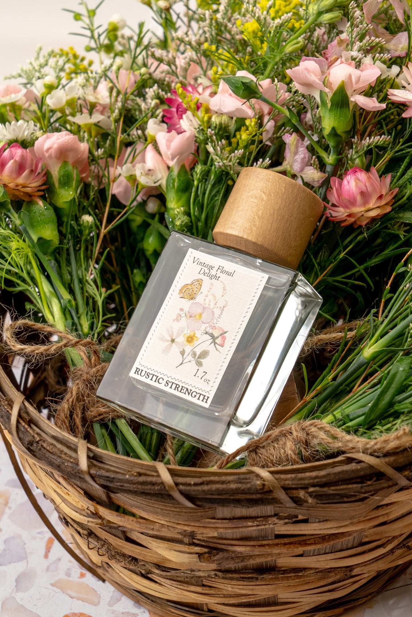 Rustic Strength Vintage Floral Delight perfume bottle, 1.7oz with elegant floral design and vintage-inspired label.