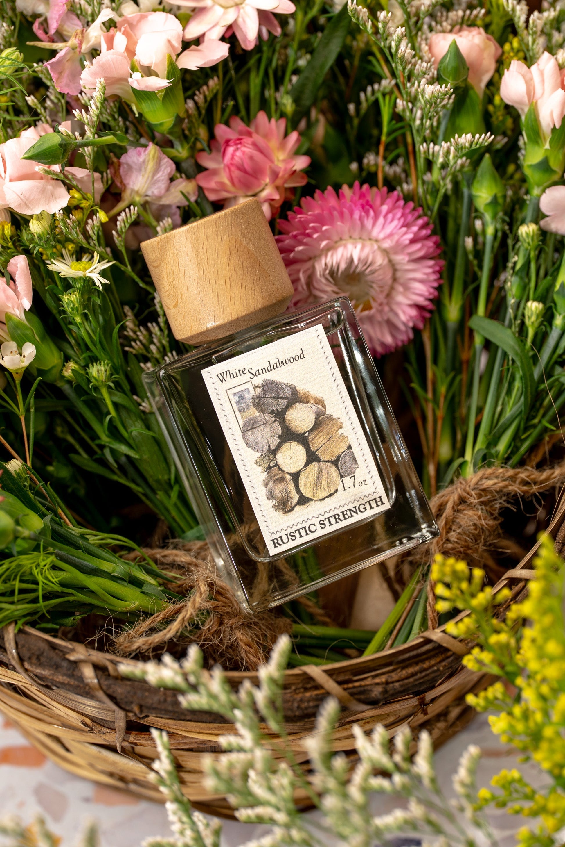 Rustic Strength White Sandalwood perfume bottle, 1.7oz with elegant design, showcasing the fragrant sandalwood scent.