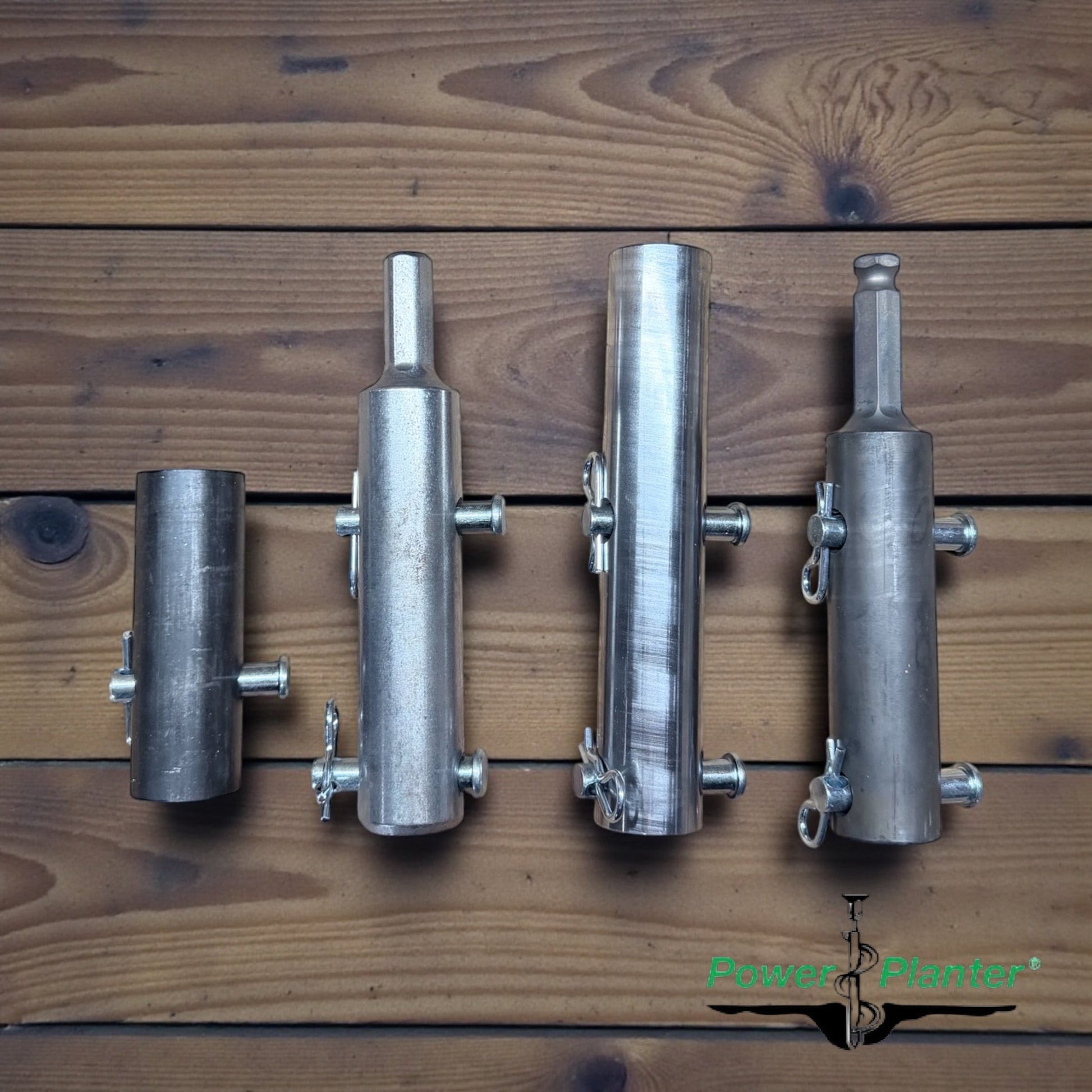 Power Planter Augers auger adapters for accessories, shown attached to auger equipment in a close-up image.