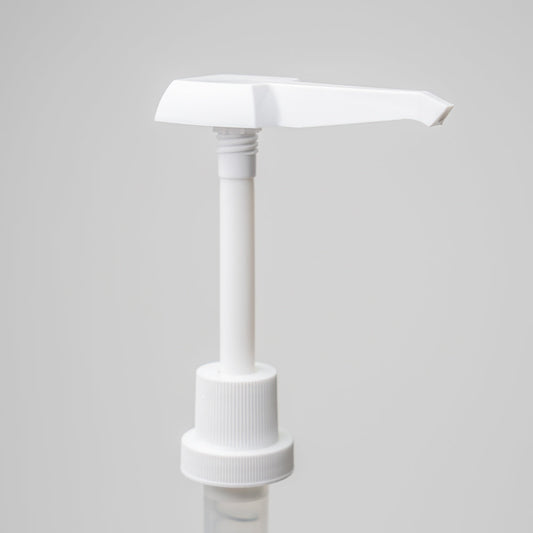 A close-up of the Rustic Strength Half Gallon Plastic Jug Measuring Pump features its white plastic dispenser with nozzle, shaft, and screw-on cap, upright atop the jug against a plain light gray background—designed to help reduce waste.