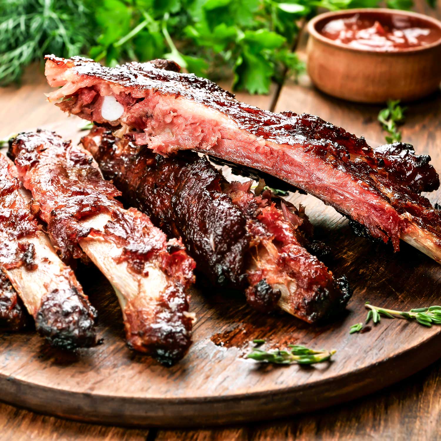 BBQ Memphis Riblets by Pig of the Month BBQ, shipped nationwide, showcasing tender, flavorful riblets ready to enjoy.