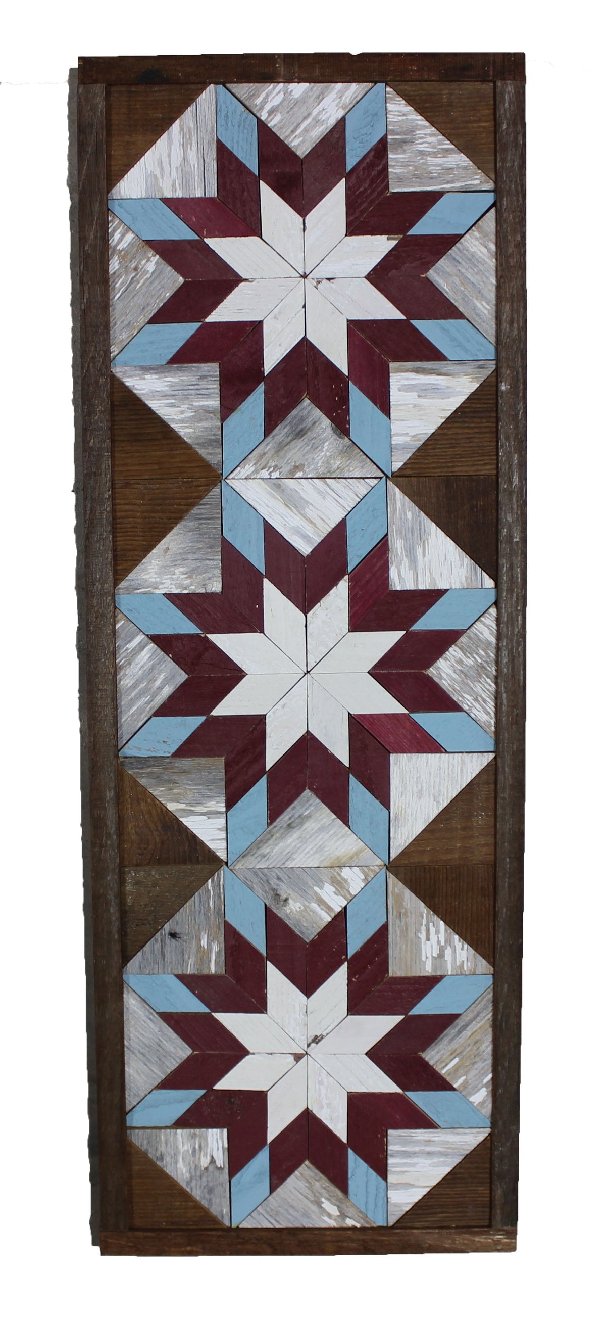 Amish handmade barn quilt banner in vibrant geometric pattern, measuring 10.5 by 30 inches, displayed outdoors.