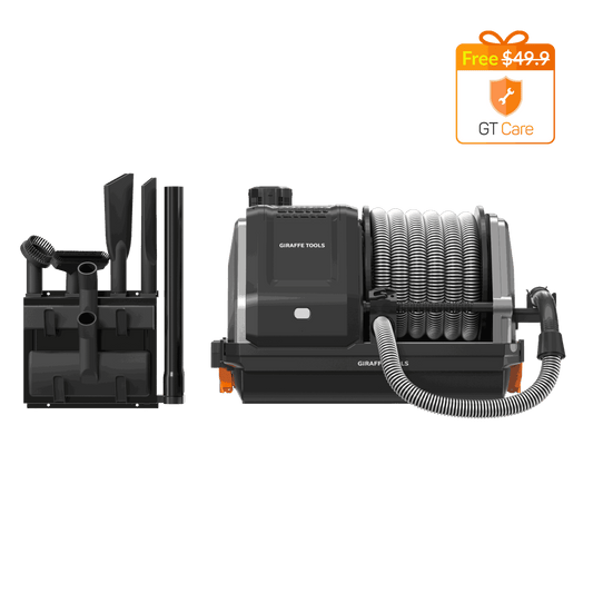 Giraffe Tools US Grandstorm retractable garage vacuum cleaner with hose and attachments in a garage setting.