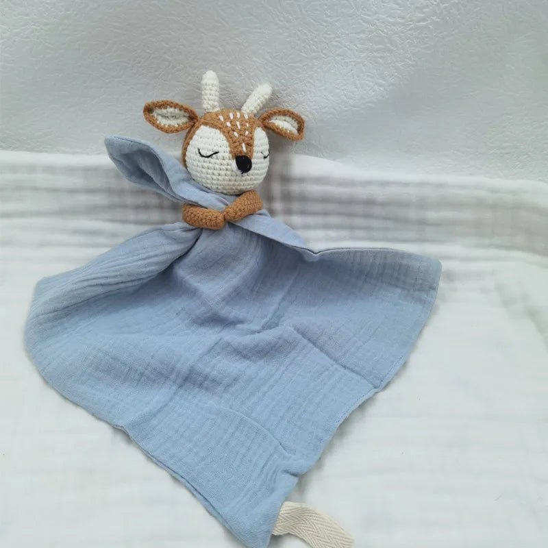 Baby bib with sleeping animals and rattle by Petite Pioneers, soft fabric, colorful design, perfect for feeding and teething.