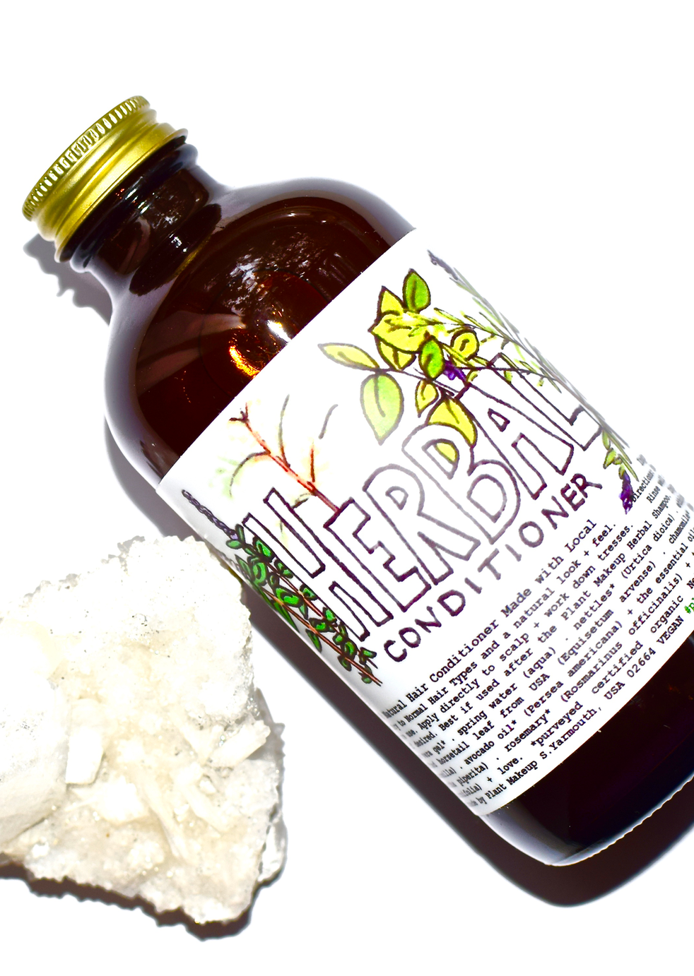 Herbal conditioner by plant makeup showing a bottle with natural ingredients and label, suitable for nourishing hair.