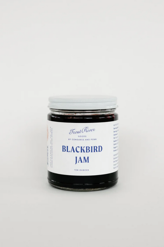 Congaree and Penn Blackbird Jam preserves jar with blackberries, showcasing the rich, dark berry spread in a clear glass jar.