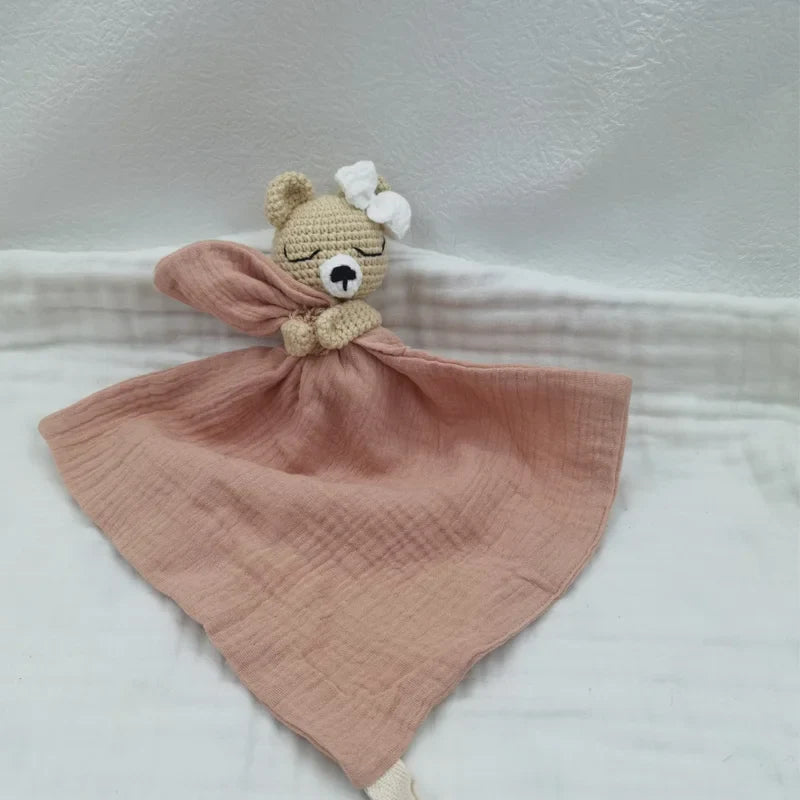Baby bib with sleeping animals and rattle, made by Petite Pioneers, featuring soft fabric and playful animal designs.