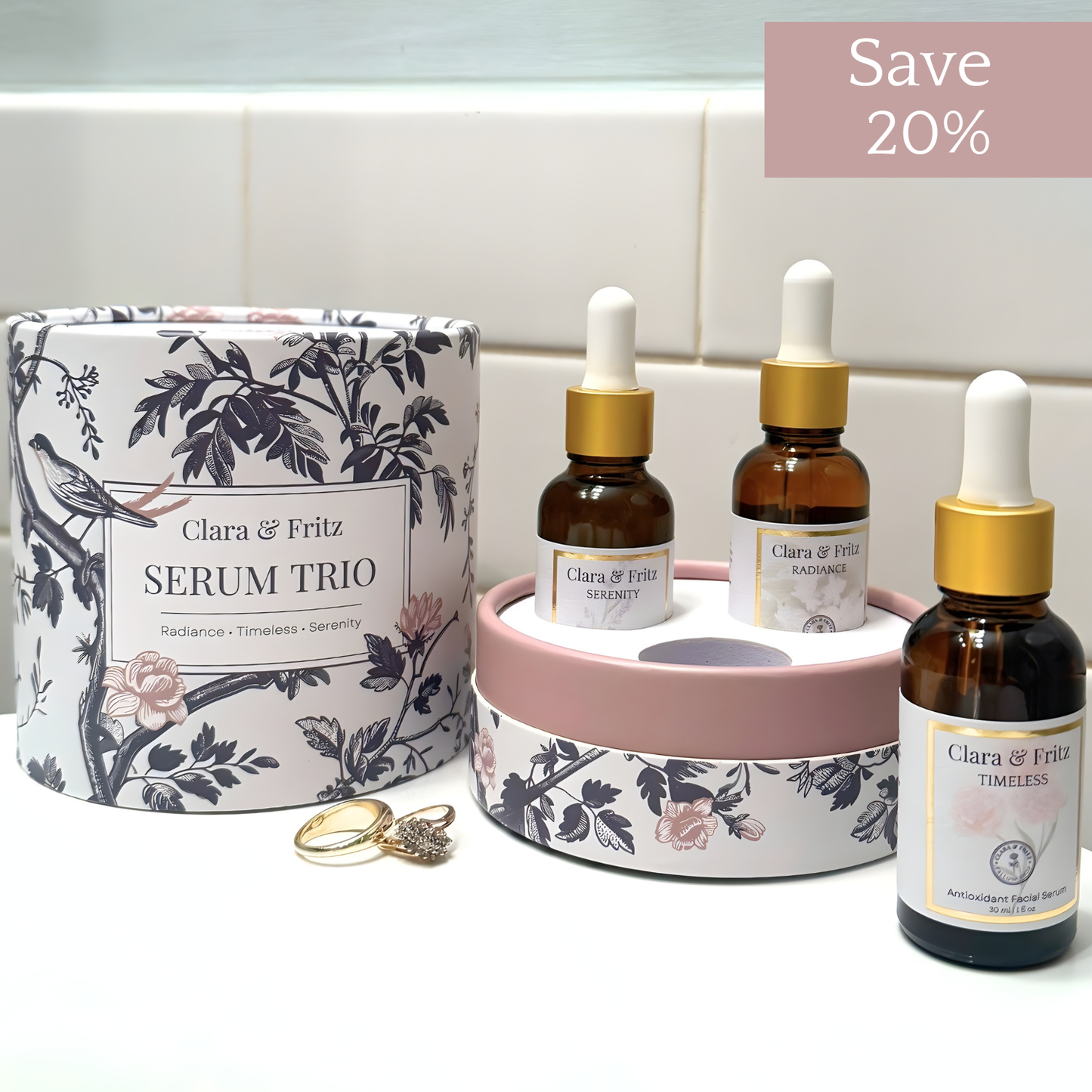 Clara & Fritz Tallow Shop Radiance Instant Glow Facial Serum trio gift set in elegant bottles with labels and packaging.