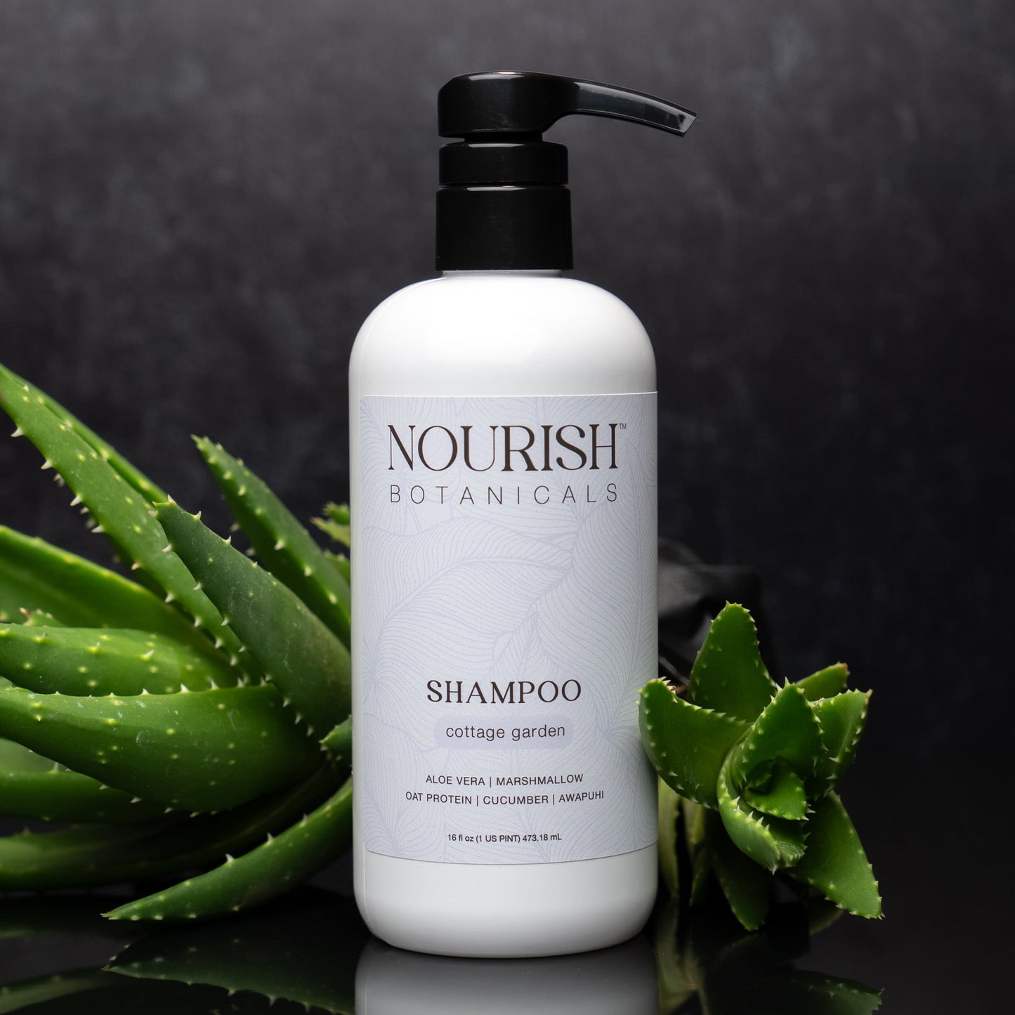 Rustic Strength Aloe Vera Shampoo from Cottage Garden, 16 oz bottle with clear label and green aloe vera imagery.