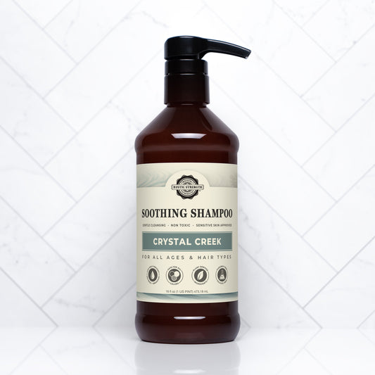 Rustic Strength Crystal Creek Soothing Shampoo in 16 oz bottle showing the clear, gentle formula suitable for sensitive hair.