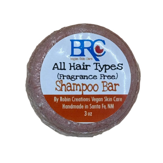 Un scented gentle shampoo bar for all hair types by By Robin Creations, shown in a natural, eco-friendly packaging.