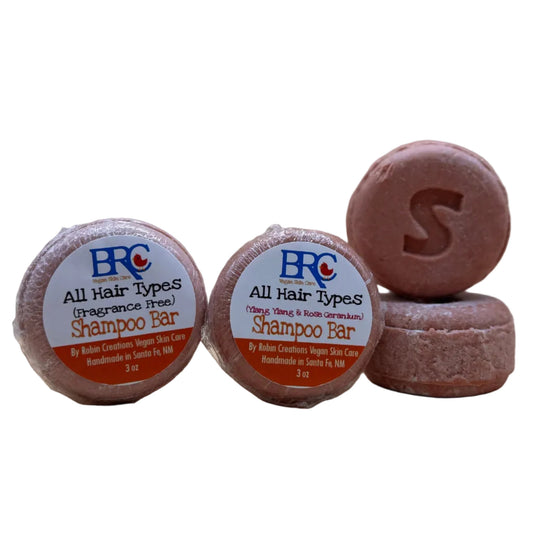 By Robin Creations gentle shampoo bar for all hair types, shown in a group image of multiple shampoo bars.