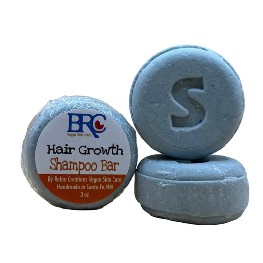 By Robin Creations hair growth shampoo bar with natural ingredients, shown in a sleek, eco-friendly soap bar form.