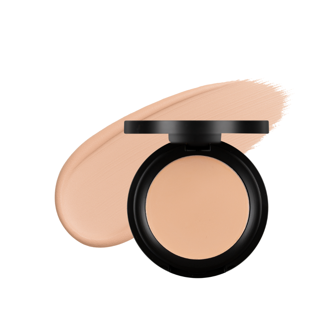 Cream concealer by Taylor Made Organics in shell shade, lightweight and versatile for natural coverage.