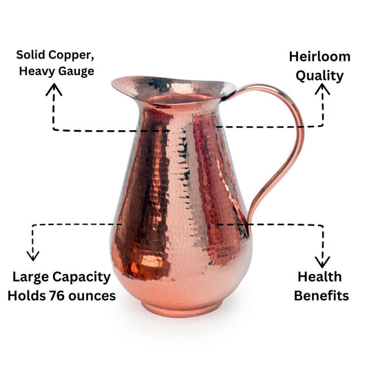 Sertodo Bisotun copper water pitcher with a polished finish, traditional design, and sturdy handle for serving beverages.