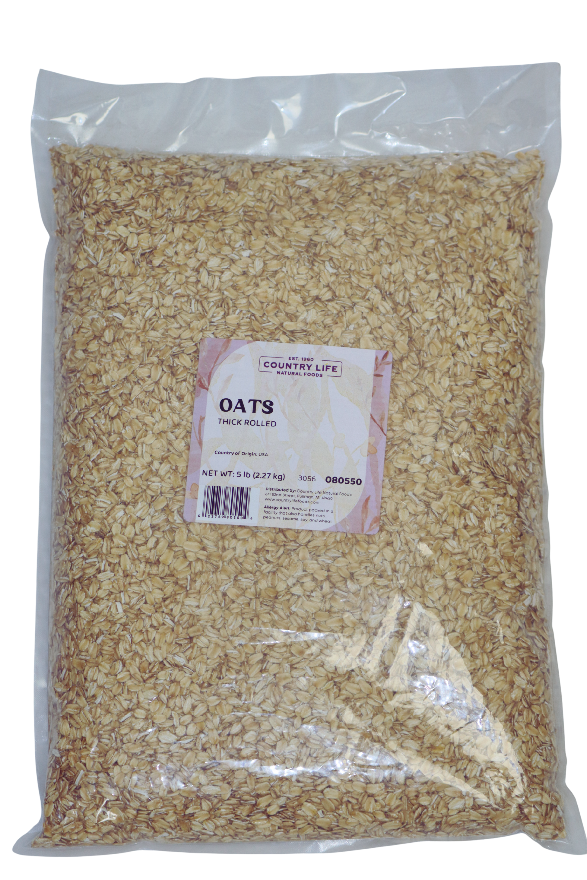 Organic thick rolled oats from Country Life Natural Foods, showing a close-up of the textured, hearty oats in a bowl.