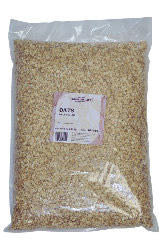 Organic thick rolled oats from Country Life Natural Foods, showing a close-up of the textured, hearty oats in a bowl.