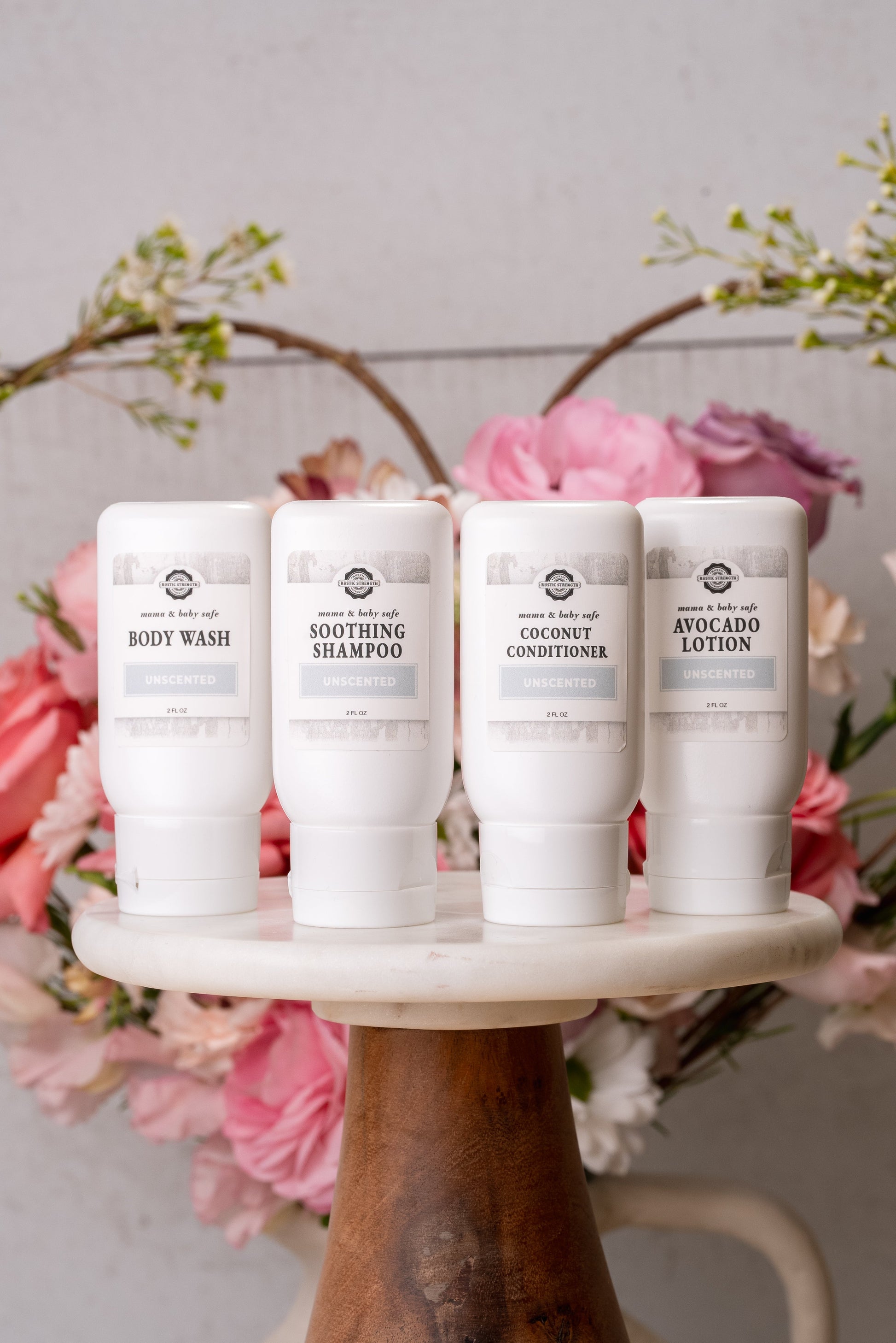 Rustic Strength travel kit for mama and baby, including 2 oz bath and body products in a compact set for on-the-go use.