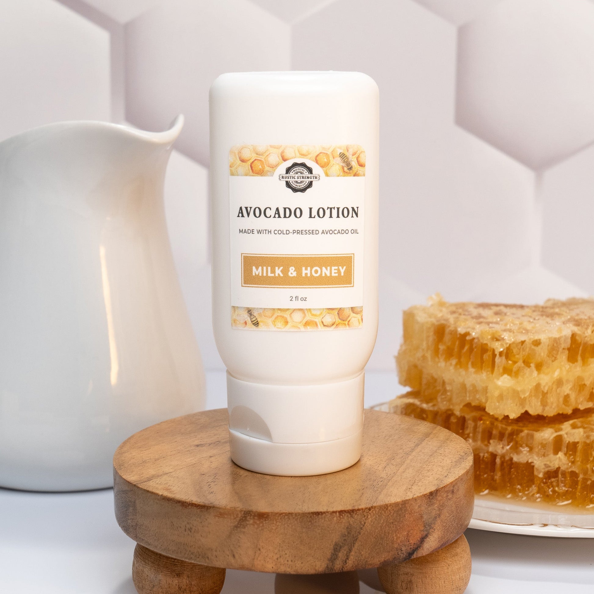 Rustic Strength Milk & Honey travel kit with 2 oz bath and body lotion in a compact container, perfect for on-the-go skincare.