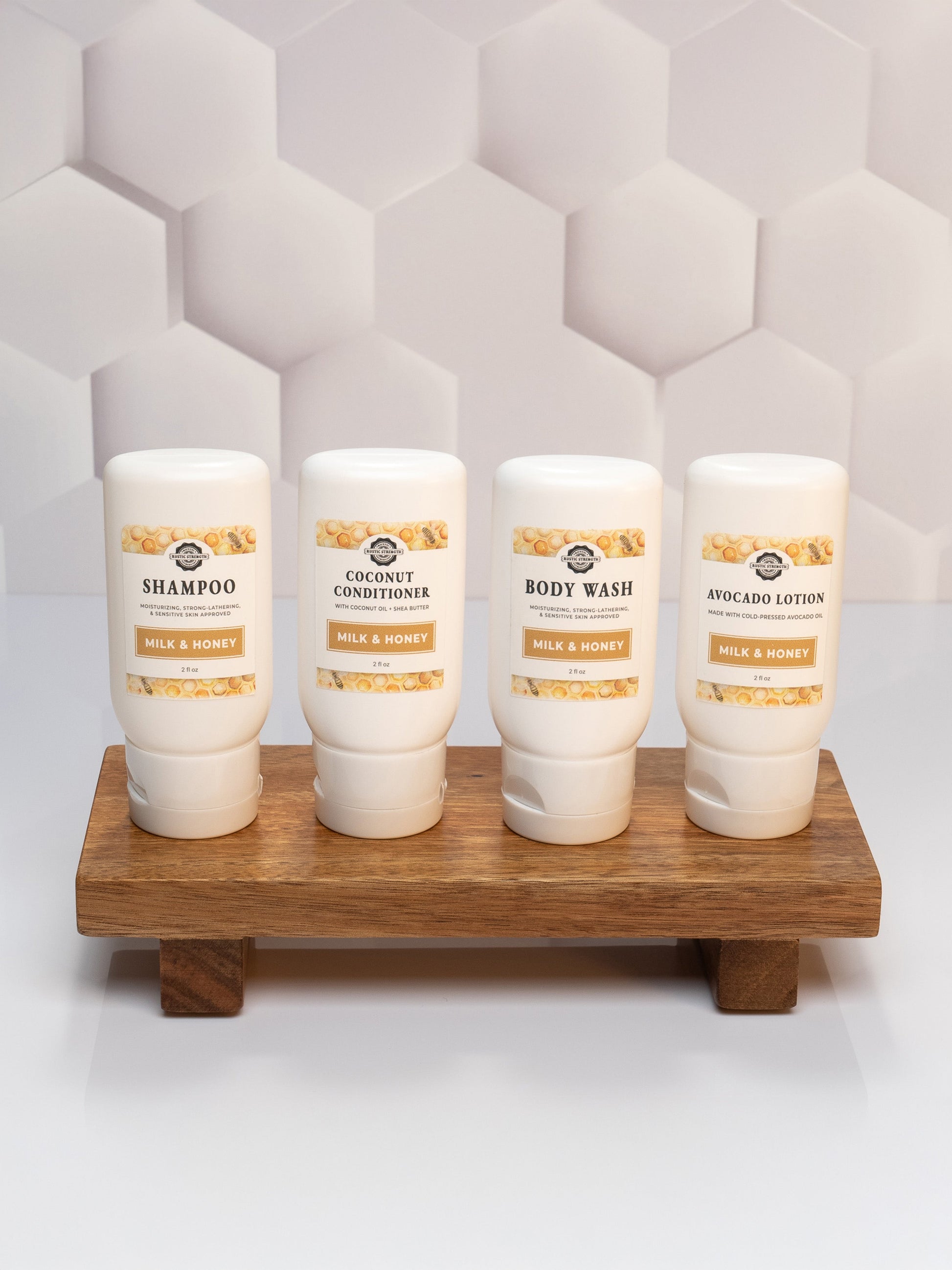 Rustic Strength Milk & Honey Travel Kit with 2 oz bath and body products, including lotion, soap, and body wash in a compact set.