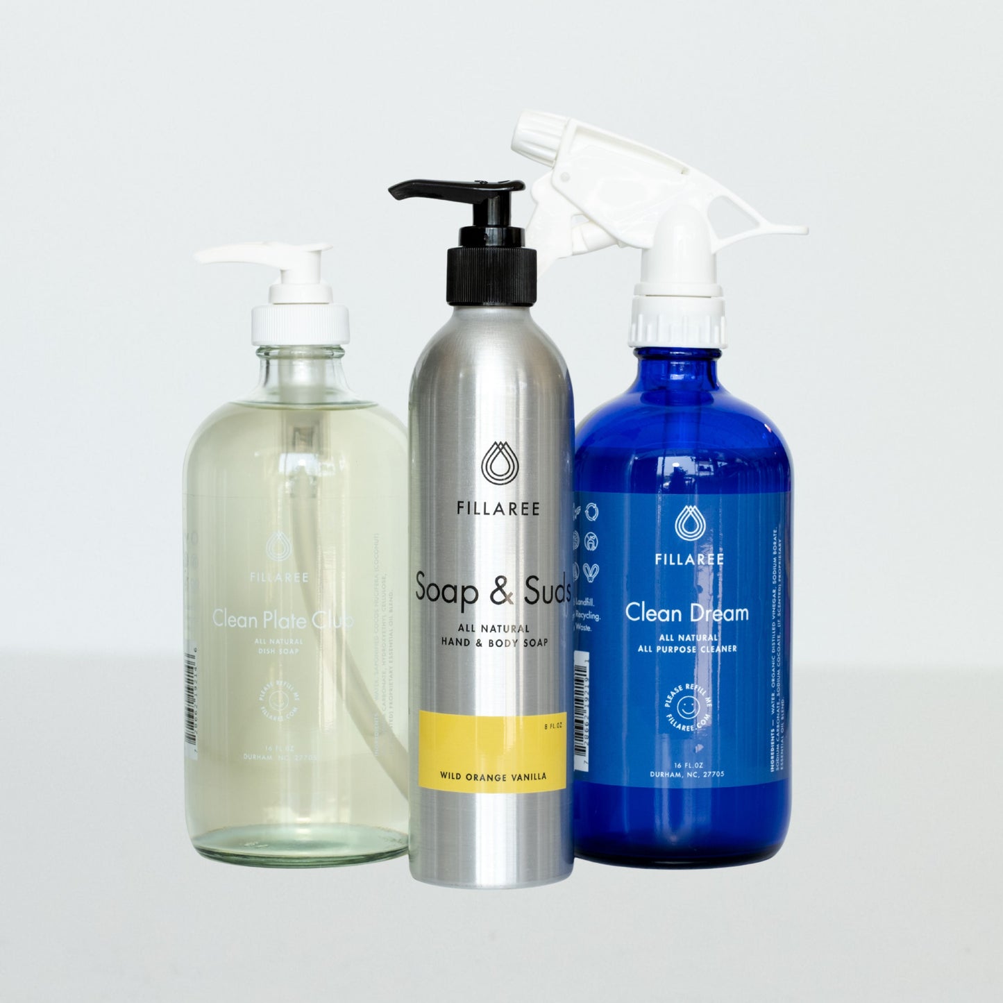 Fillaree refillable trio of natural cleaning products with wild orange and vanilla scents, eco-friendly refillable containers.