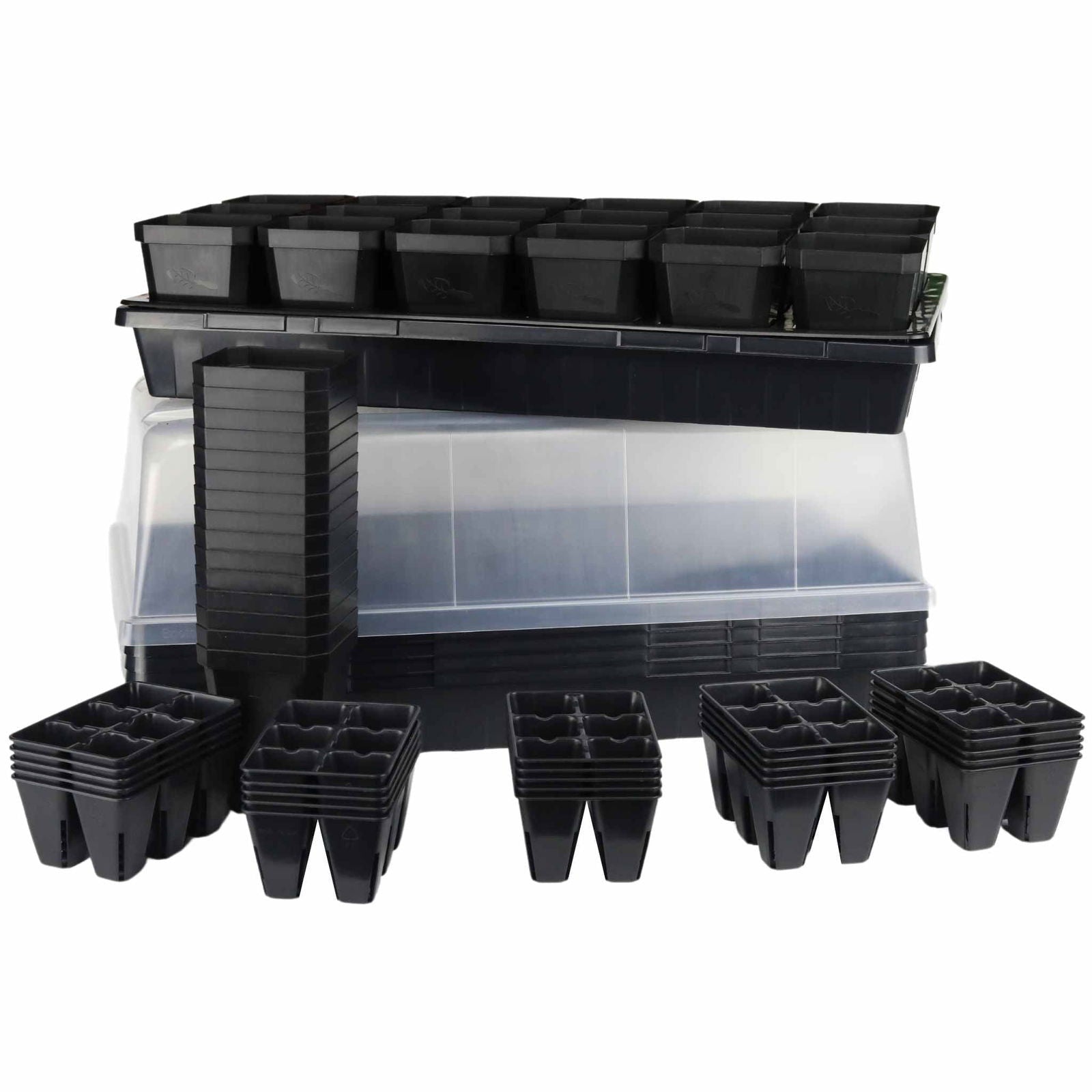 Plastic seedling starter kit with multiple black seed trays a clear plastic dome and stacks of individual cells showing leaf-shaped logos and textured bases
